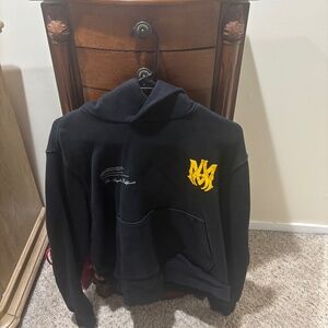 amiri black and yellow hoodie